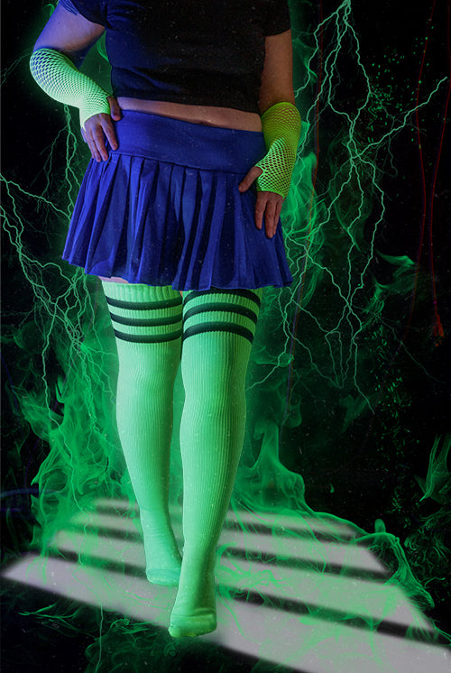 A person wearing Electric Shock thigh highs in neon green with black stripes