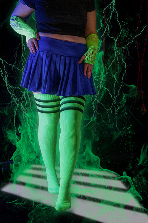 A person wearing Electric Shock thigh highs in neon green with black stripes