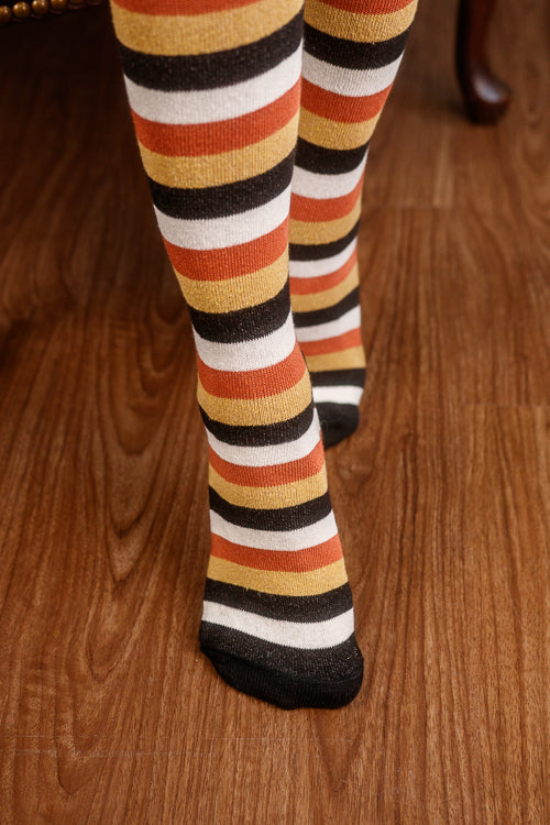 Striped socks on a wooden floor