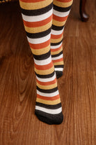 Striped socks on a wooden floor