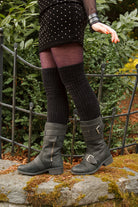 A person wearing Inky Void Chenille Thigh Highs in black