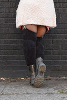 A person wearing Inky Void Chenille Thigh Highs in black