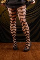 Slinking through the web net tights in black