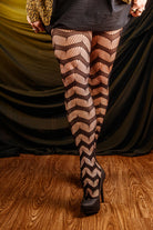 Slinking through the web net tights in black