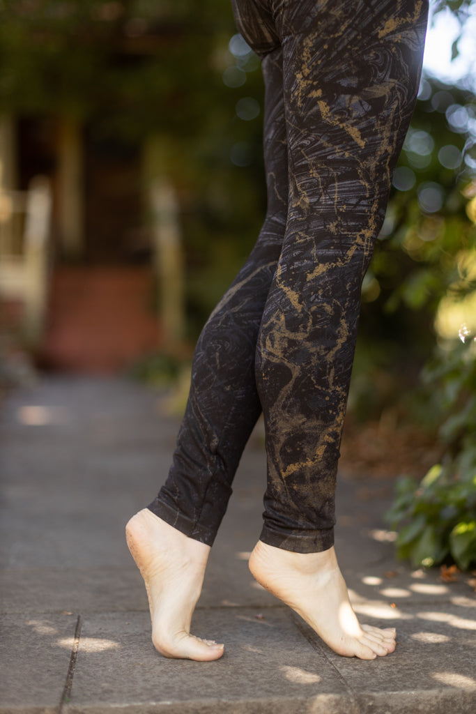 Black and brown floral printed leggings. Polyester spandex blend