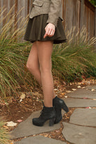 A person wearing Jennifer Wool Tights in Hazelnut