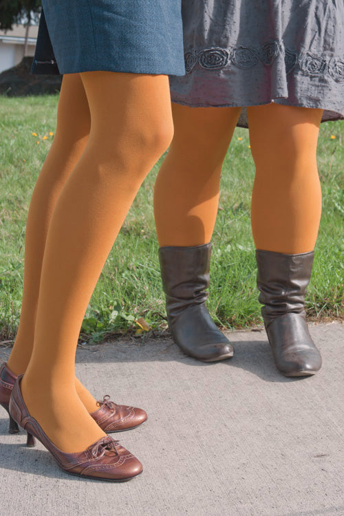 I usually don't like tights with open-toed shoes, but this is cute