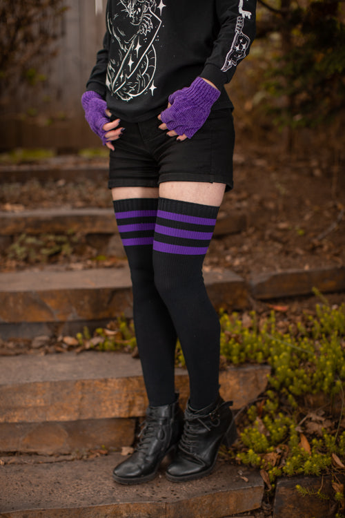 https://sockdreams.com/cdn/shop/products/drs-gothic-americana-black-purple-striped-thigh-high-socks-2.jpg?v=1682242873&width=500