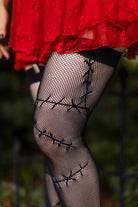 Stitched Up Fishnet Thigh High